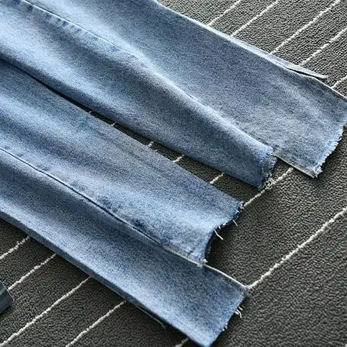 2019春夏款复古潮流港范不规则剪破毛边直筒浅蓝牛仔裤女~03.23