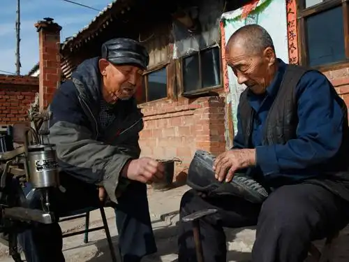 [助人为乐]"分文不取"的座右铭——记北京六建集团公司退休职工周尚平