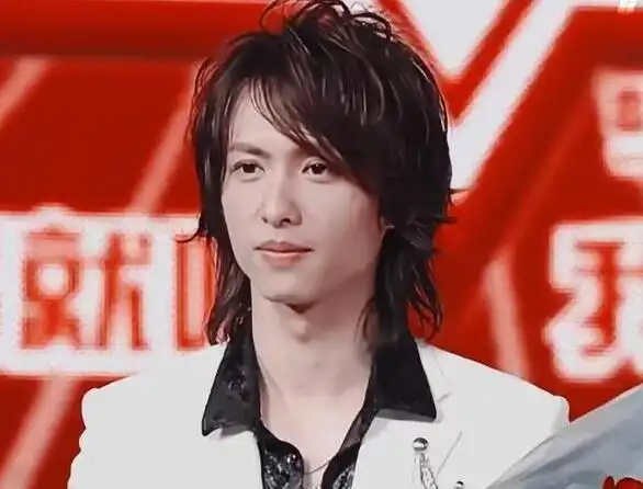 张淇年龄多大老婆是杨旭吗张淇是黑豹的第几任主唱有孩子么