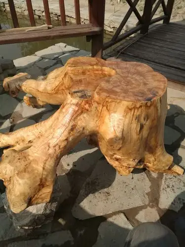 用烂树根制作茶台