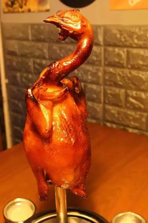 收获大批粉丝02■ 众多美食,让你大饱口福 ■顺德吊烧鸡广东人对鸡情