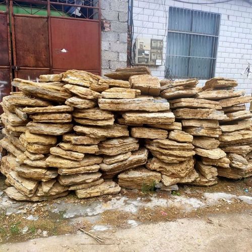 精品千层石假山石料小黄色千层石太湖石驳岸石草坪石庭院鱼池设计