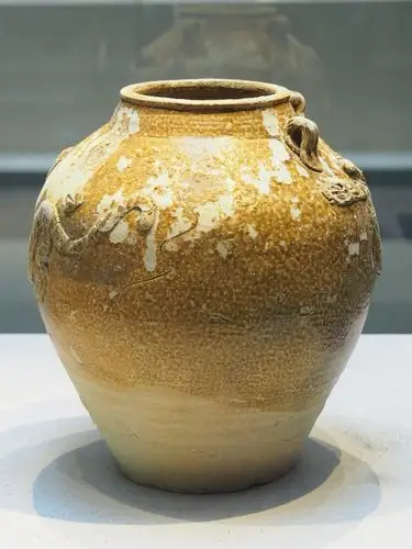 明万历褐釉堆塑龙纹四系罐汕头市博物馆藏