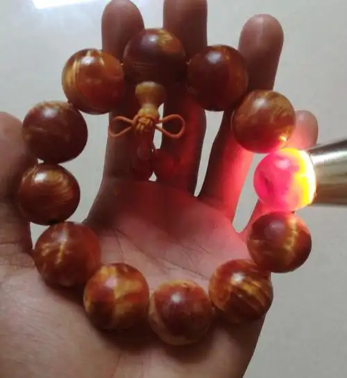 明子手串琥珀木瘤疤水波满油全透东北沉香松明子松丁男女佛珠念珠依莲