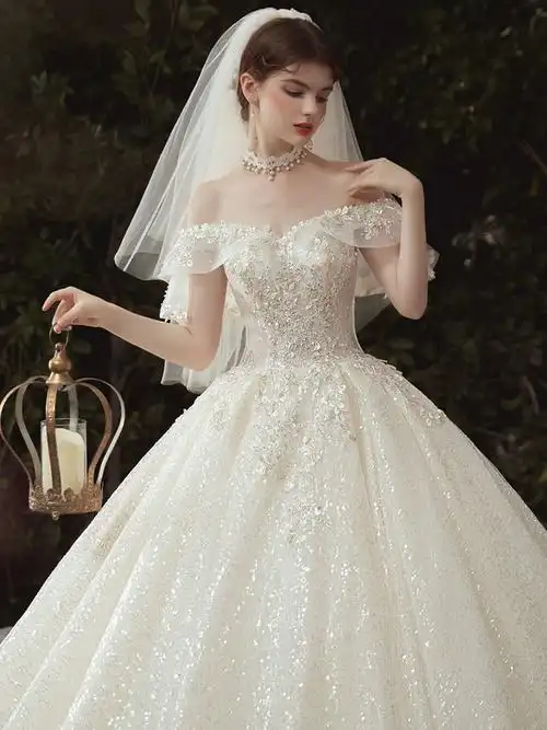 婚纱礼服2020新款新娘一字肩法式森系仙梦幻奢华拖尾亮片抹胸秋冬