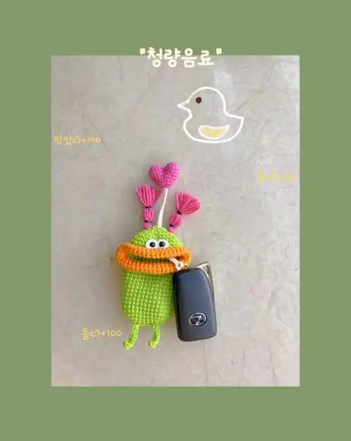 钩针毛线香肠嘴钥匙包附图解