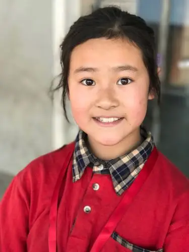 这是一个普通农村女孩,眼神清澈的让人动容