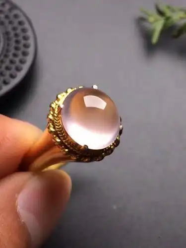 玻璃种冰白起荧光天然翡翠戒面(铜托)