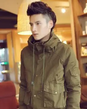 打理的蓬松翘立的发顶头发,加上时尚的深棕色染发色发型,是潮