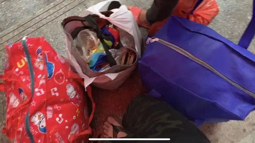 湛江打工仔:大风大雨,大包小包行李,回家过端午