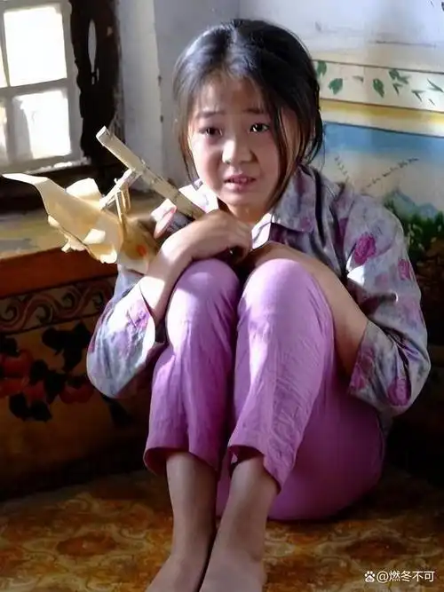 电影中,她只是一个吃糖的小女孩,然而她的表演却令人印象深刻.