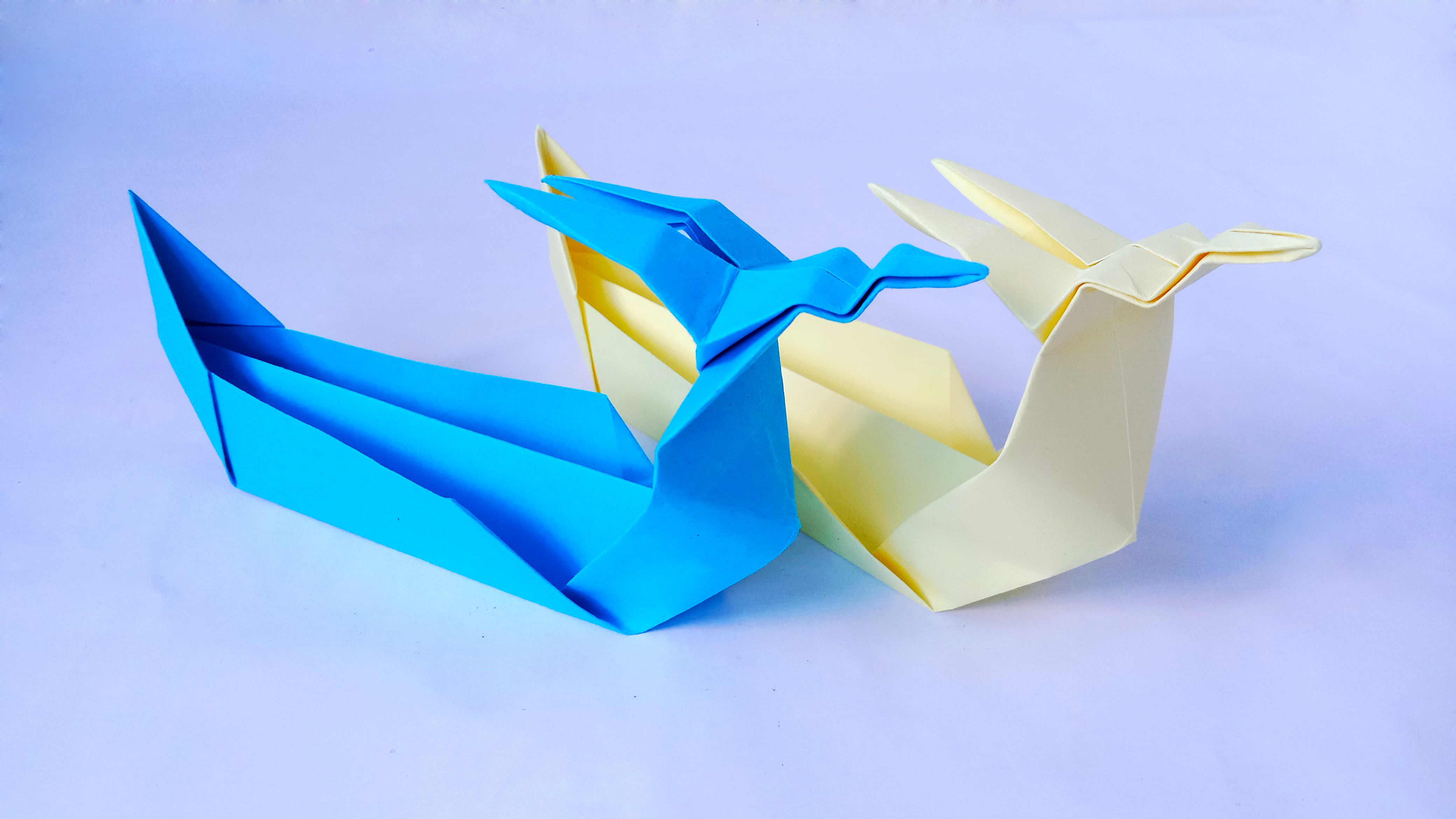 快来折纸龙舟,比比谁折更快更好看,拿半张纸就折艘龙舟#手工折纸#龙舟