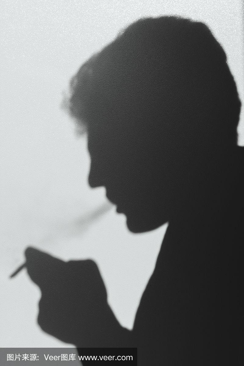 吸烟的男人的影子,抽烟的年轻人,概念抽象的背景