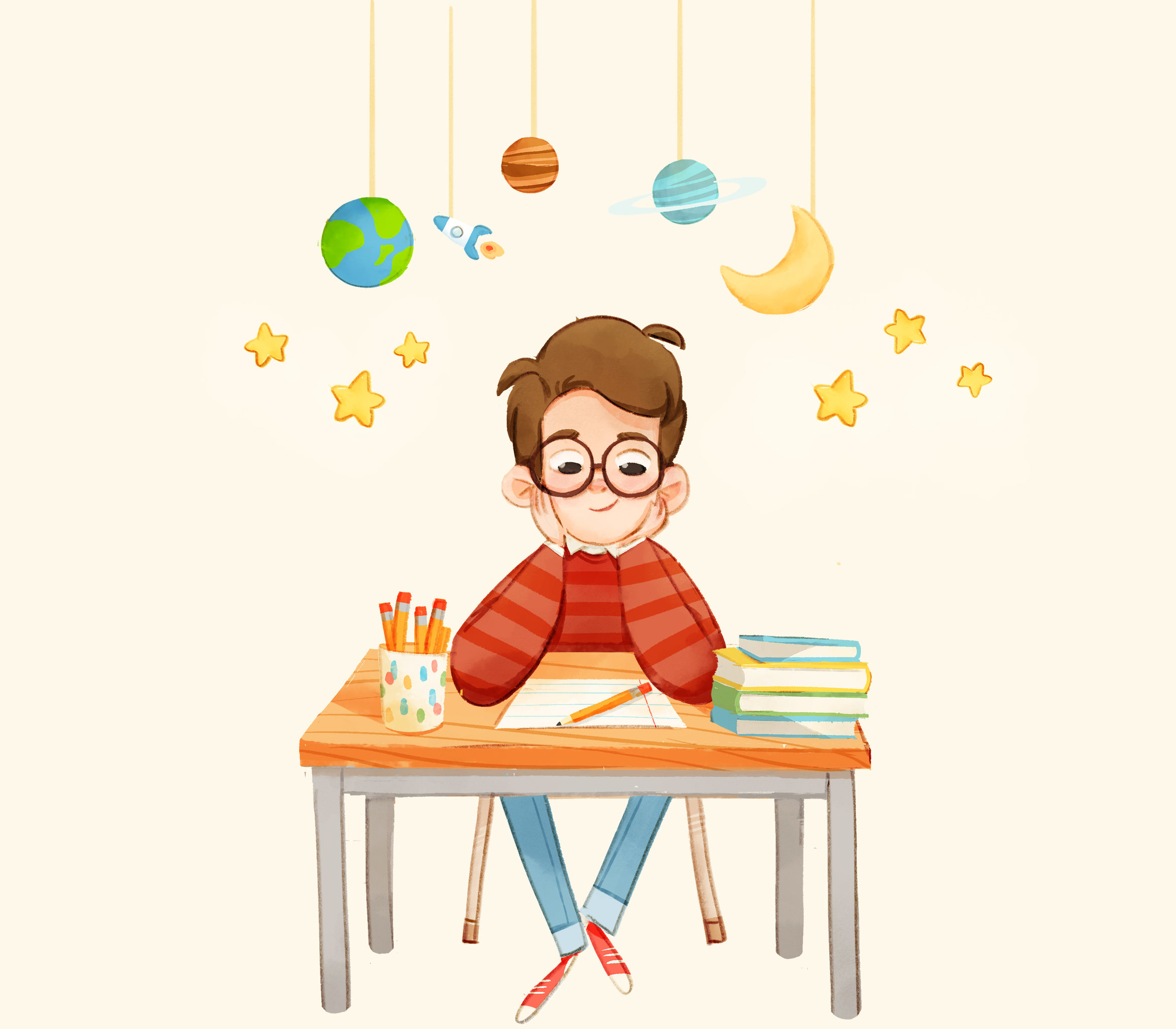 书桌前写作业的男孩