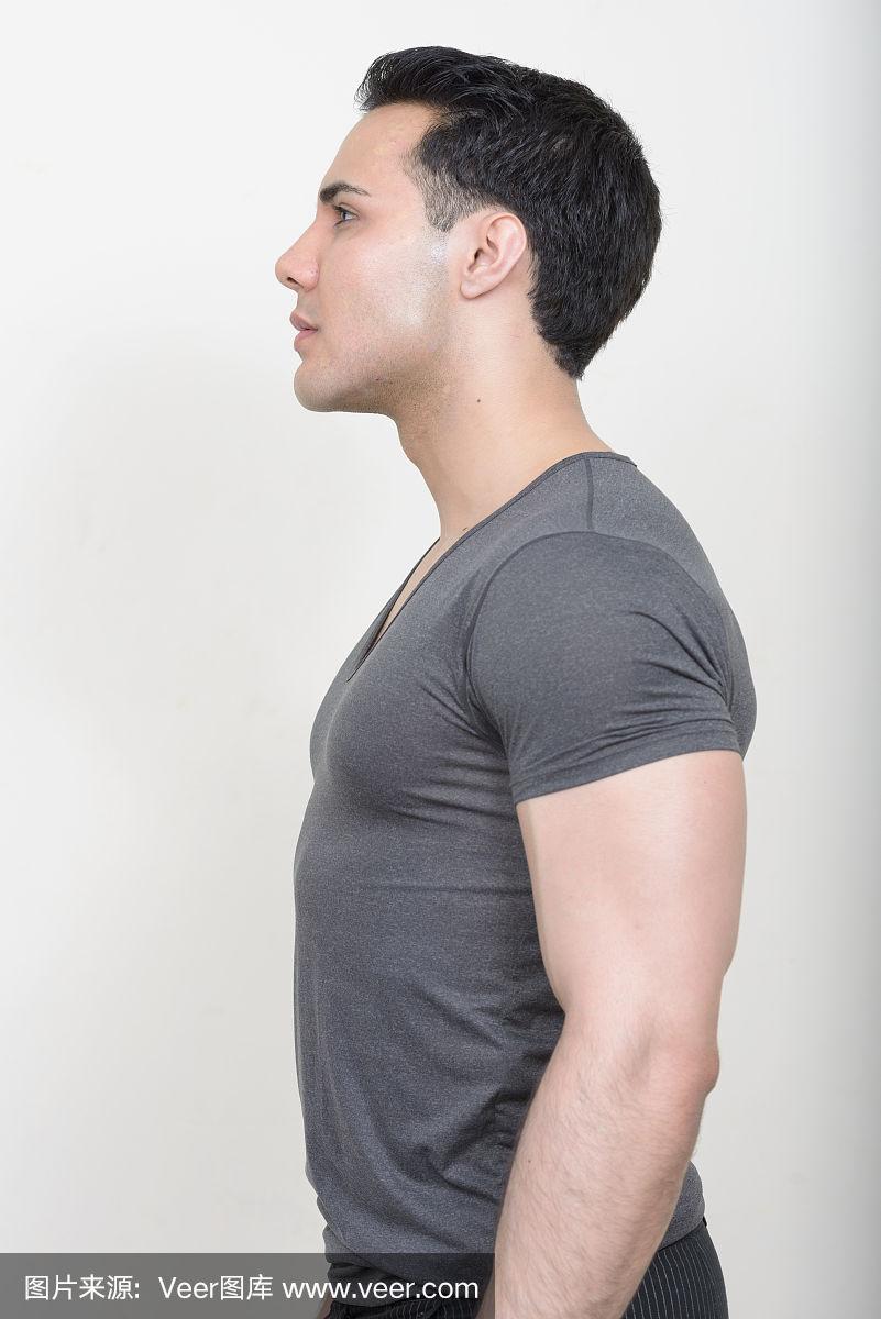 侧面视图英俊的肌肉男子
