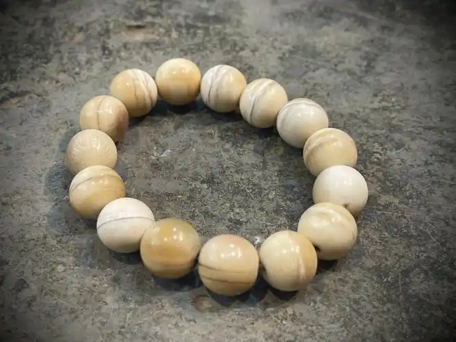 【重器】一条老的猛犸类(非)手串,大开门,笑纹明显,黄润包浆,皮壳明显