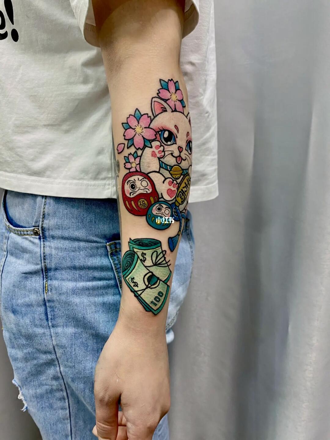 女生纹身之招财猫猫