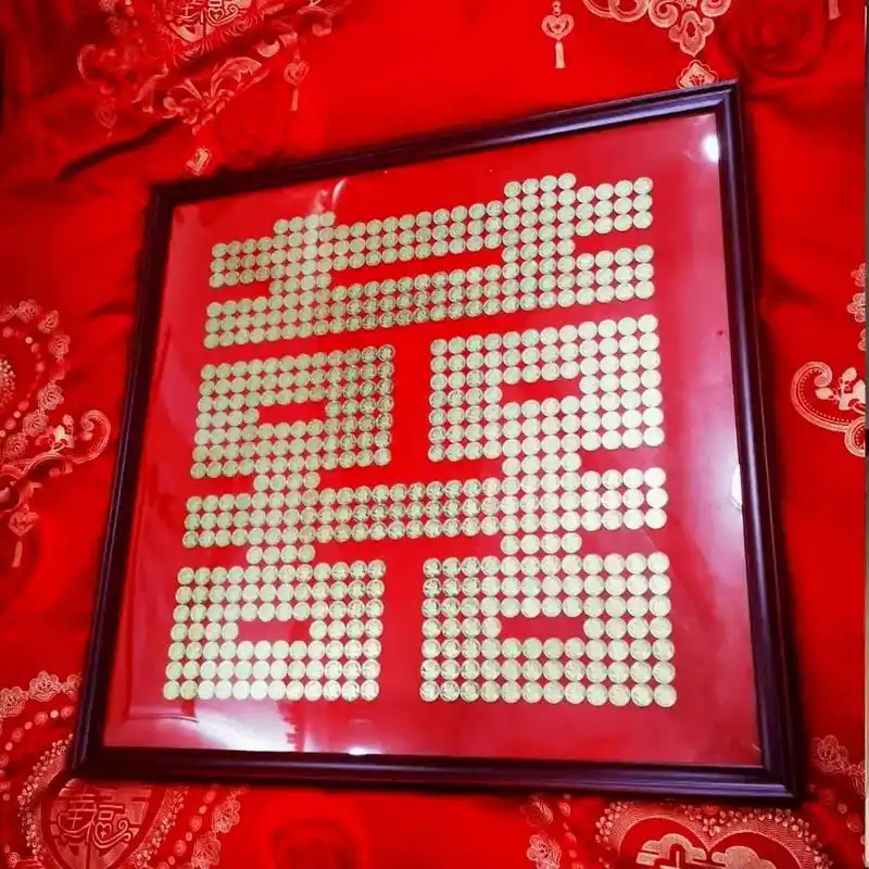 硬币黄荷花喜子作品