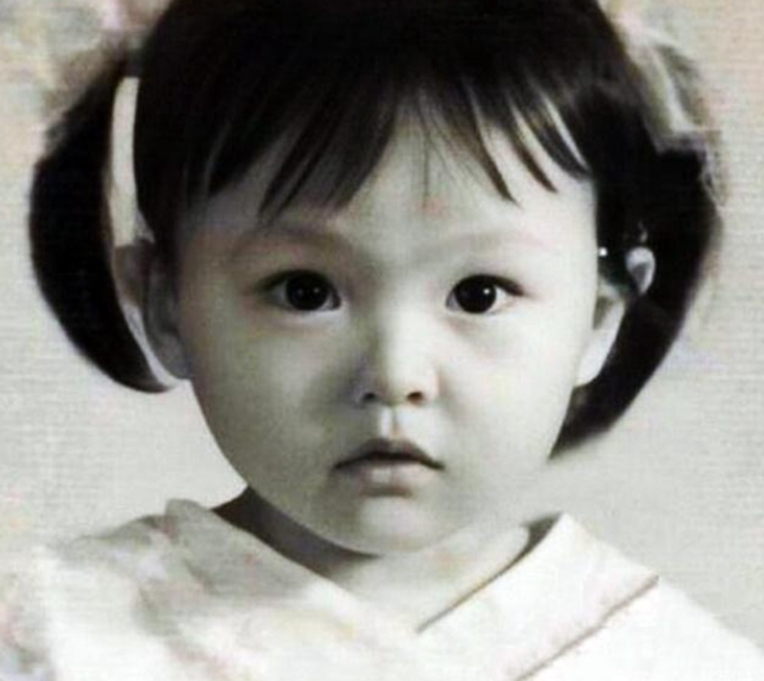 唐嫣的小时候,眼睛非常的像. 黄磊