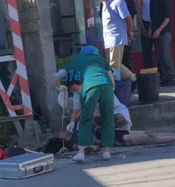 彩塘黑衣女子爬上高压电塔不幸触电坠地不起,视频拍下触电瞬间