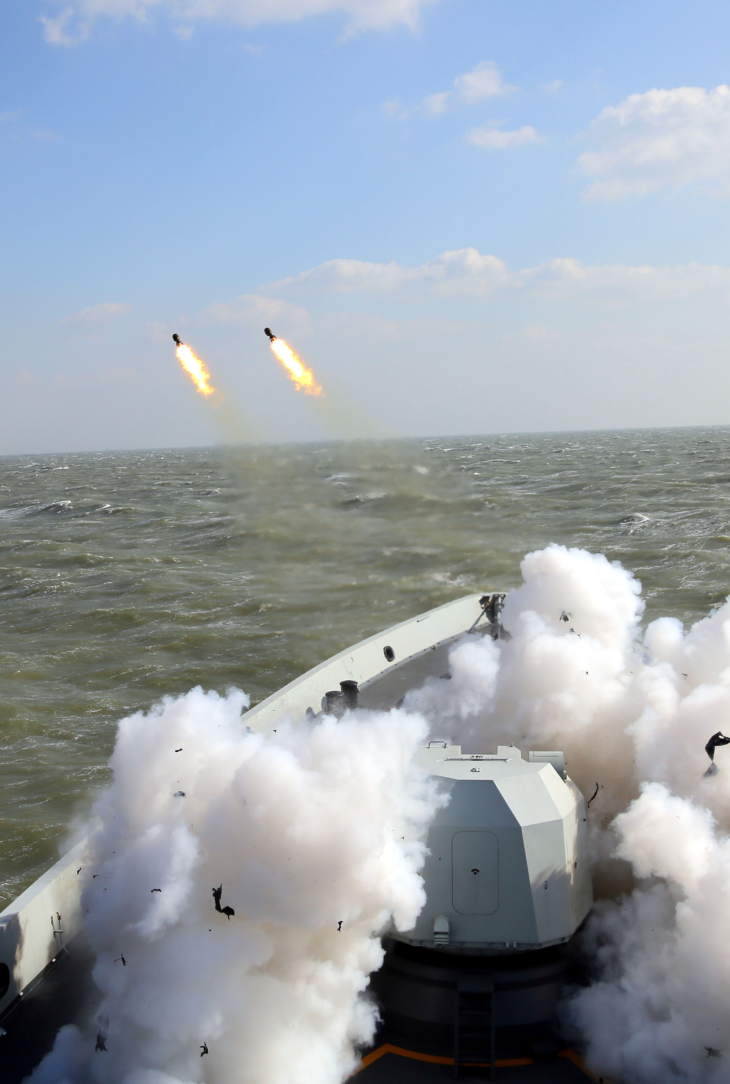 frigate jingzhou fires depth charges in east china sea