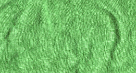 绿色亚麻布的质地.绿色亚麻背景照片