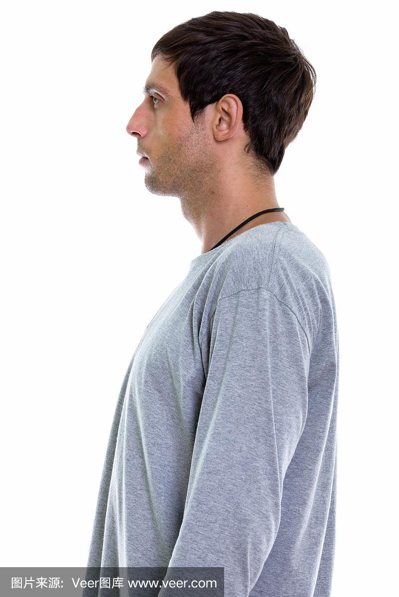 年轻英俊男子的侧面图