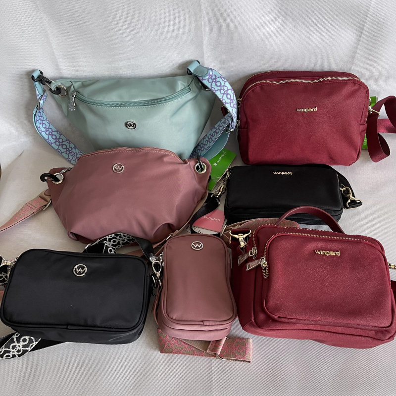 威豹正品青年促销专柜女士纯色拉链休闲运动时尚商务涤纶布斜挎包