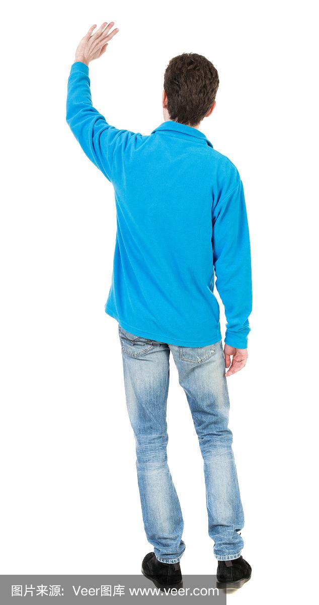 背影英俊的男子打招呼挥手从他的手