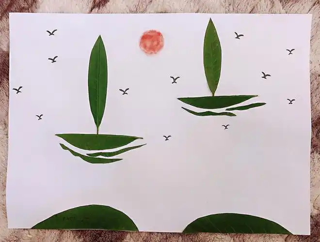 秋天的童话之"小树叶,大世界" ——记心湖小学一(1)班创意树叶画作品