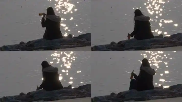 女孩喝酒借酒消愁美女孤单背影视频素材